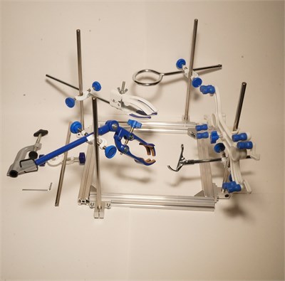 Штатив-держатель с 4-мя стойками, 2-мя лапками, кольцом 60 мм, зажимами для бюреток 1 шт и для пробирок (1 шт). tripod.4pcs